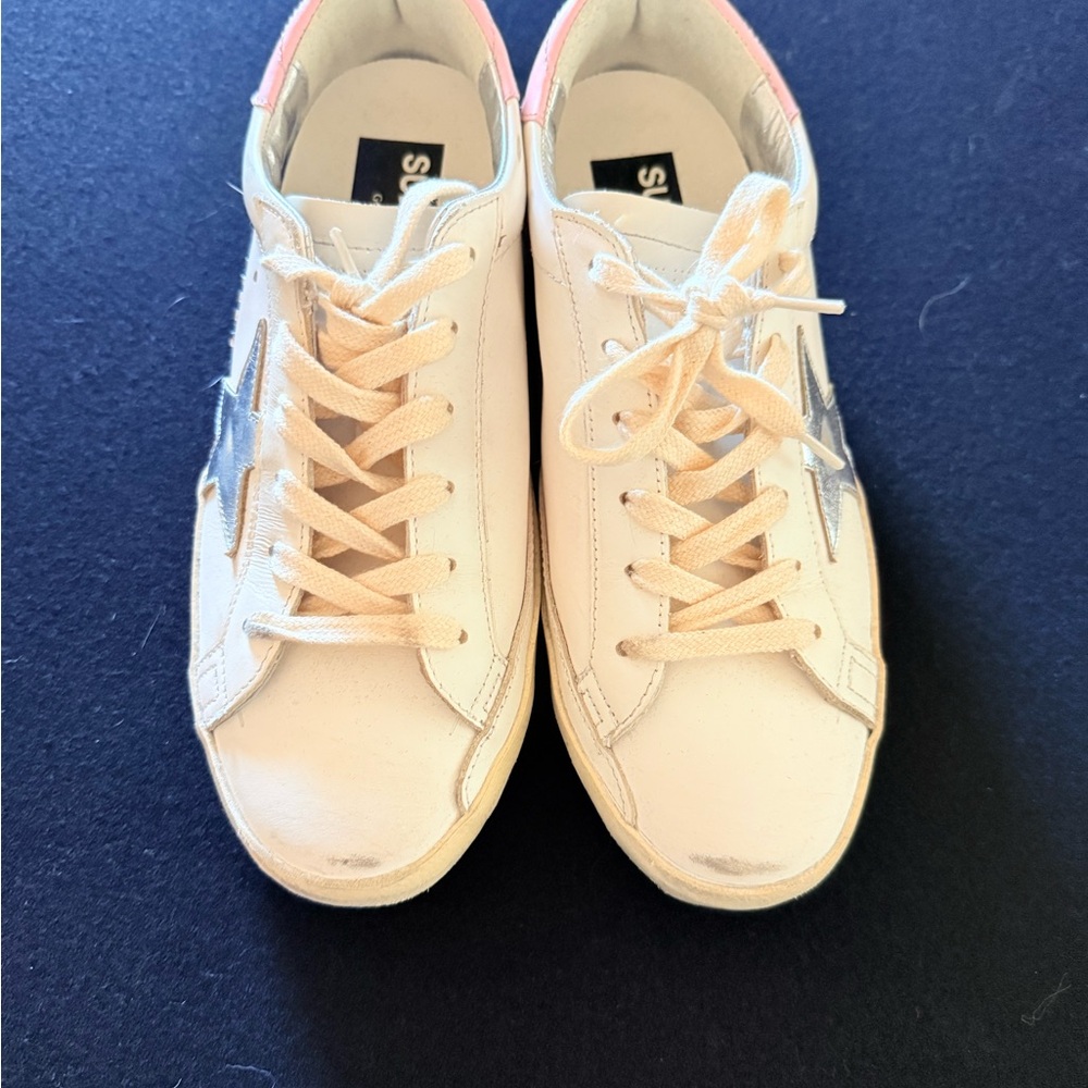 Golden Goose tennis shoes.